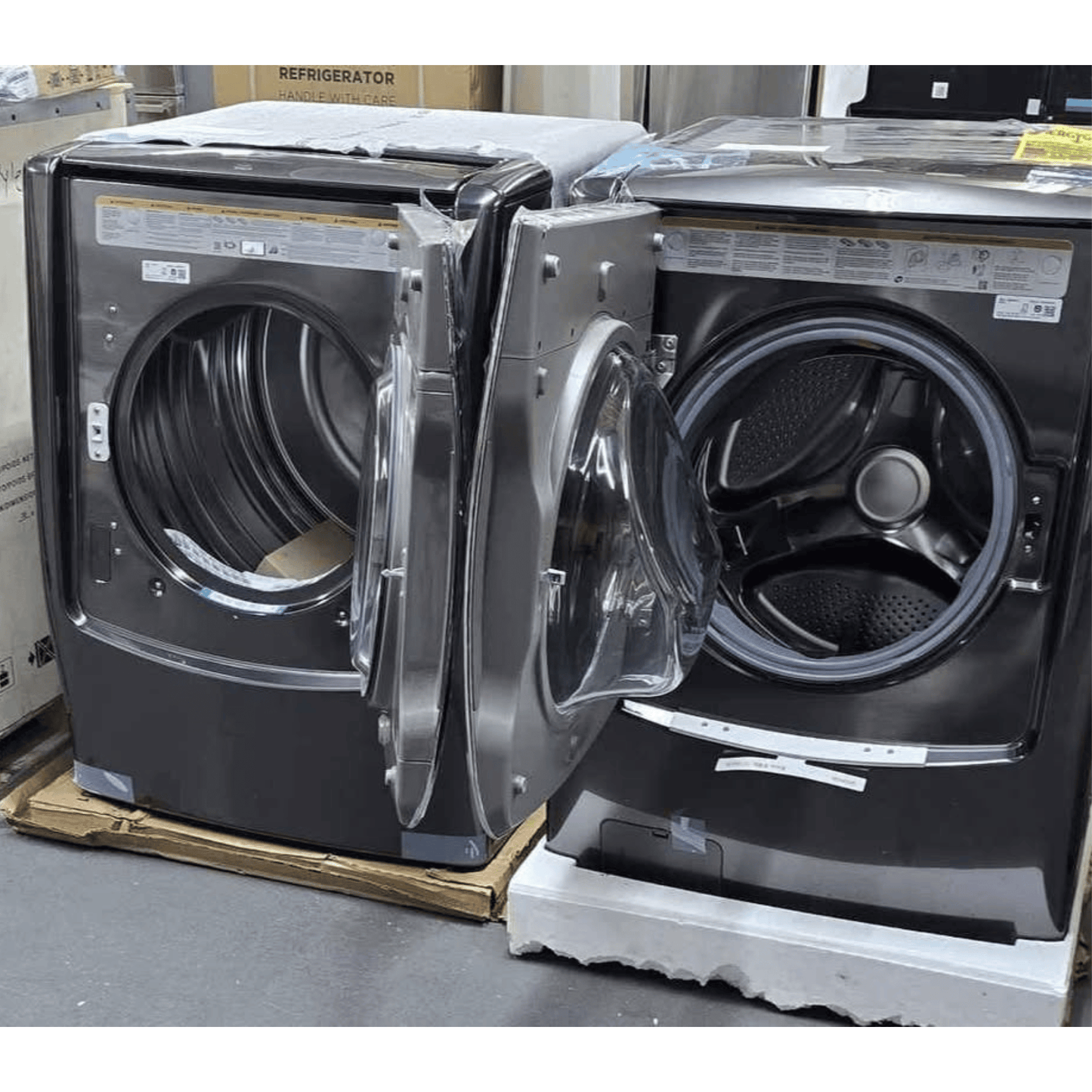 LG Signature WM9500HKA and DLEX9500K mega front load washer dryer set, black stainless