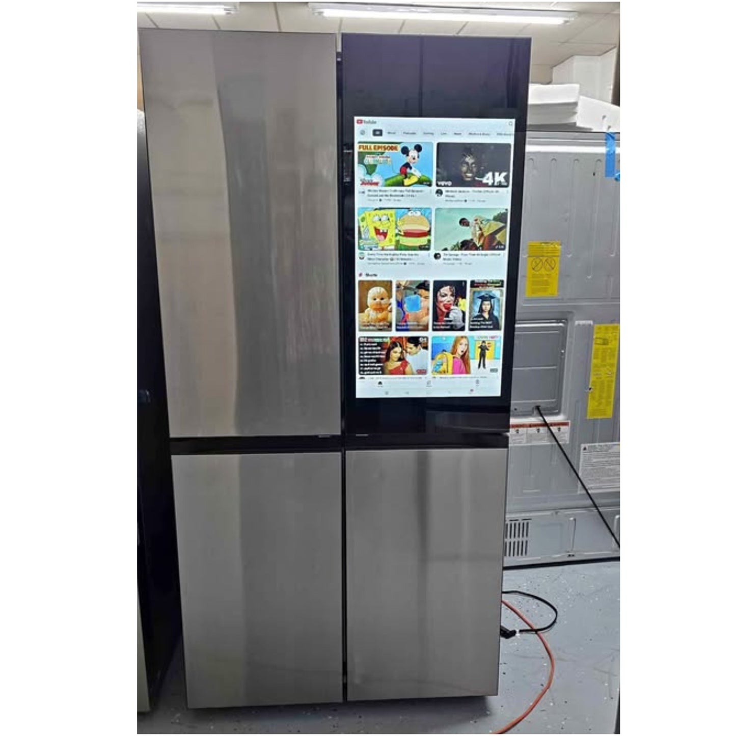 Samsung Bespoke 4-Door Flex Refrigerator with 32 inch Family Hub touchscreen and stainless steel finish